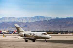 Hawker 800 private executive jet taxiing after landing at Harry Reid International Airport | Photo: Ceri Breeze