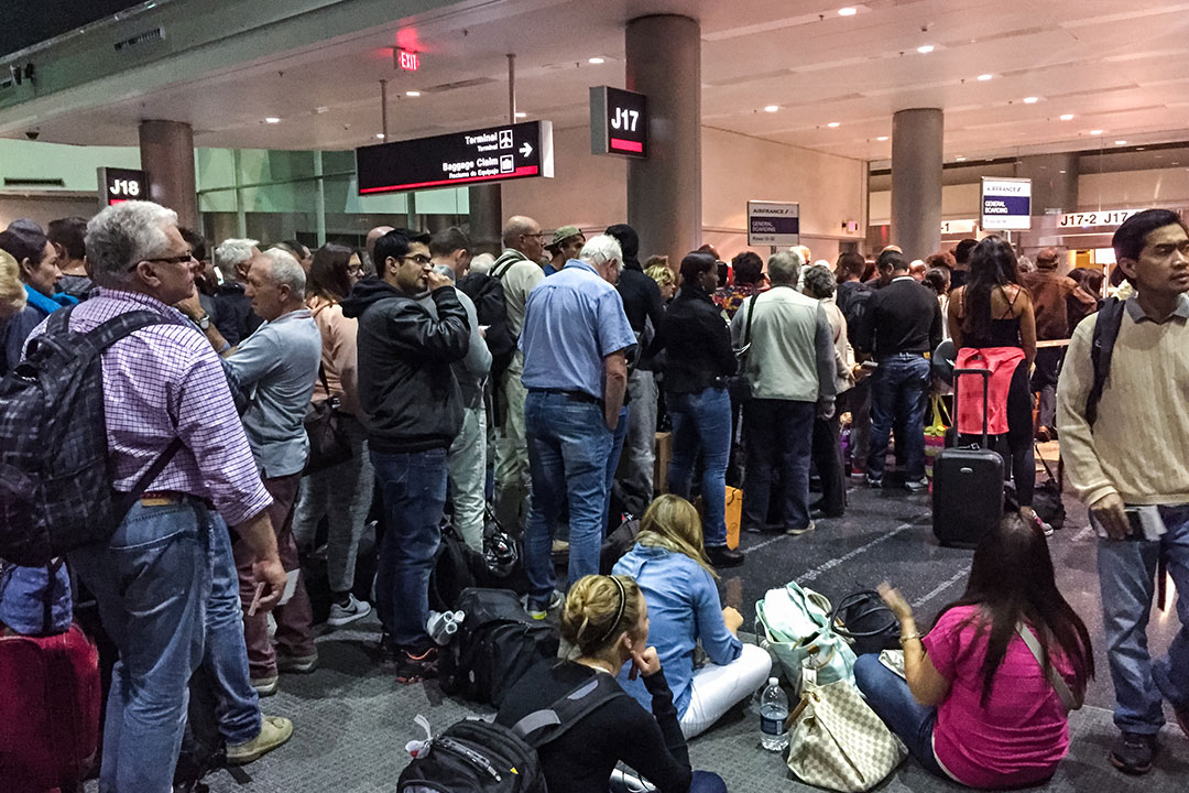 Passengers waiting at the gate for boarding on Air France flight to Paris, Miami Airport | Photo: anouchka