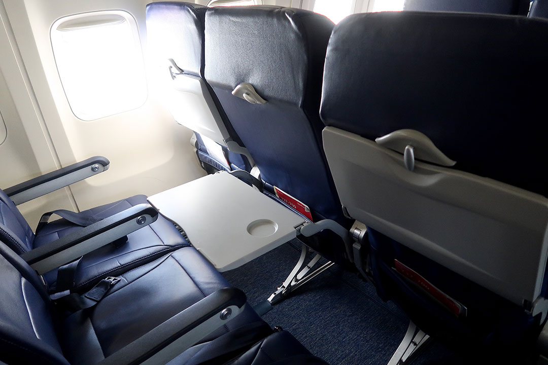 Empty seats on a Southwest airlines plane. | Photo: Red Herring / Shutterstock.com