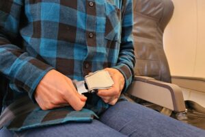 FAA regulations require passengers to be seated with their seat belts fastened: