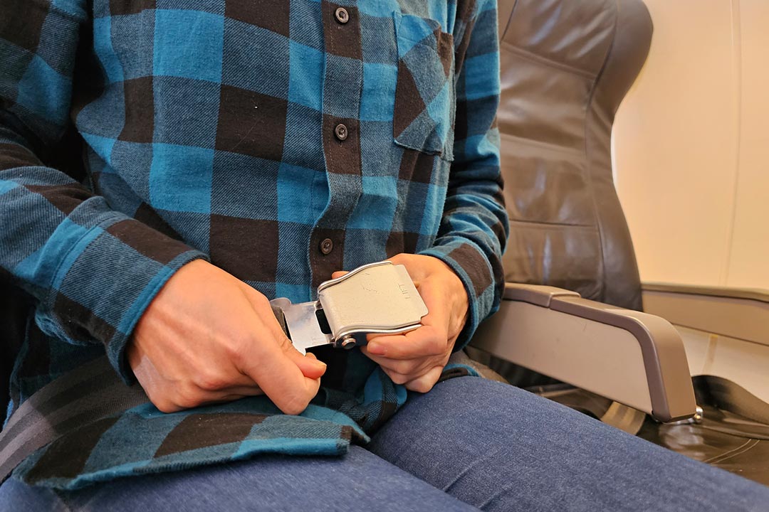 FAA regulations require passengers to be seated with their seat belts fastened: