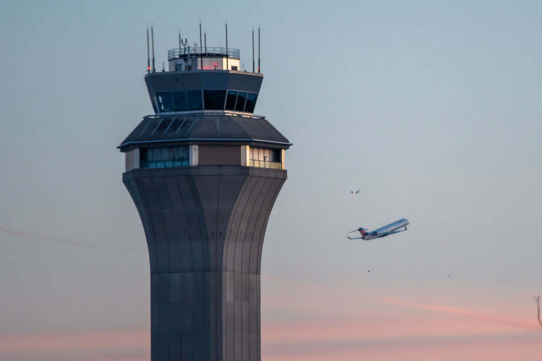 Airport control tower during takeoff 