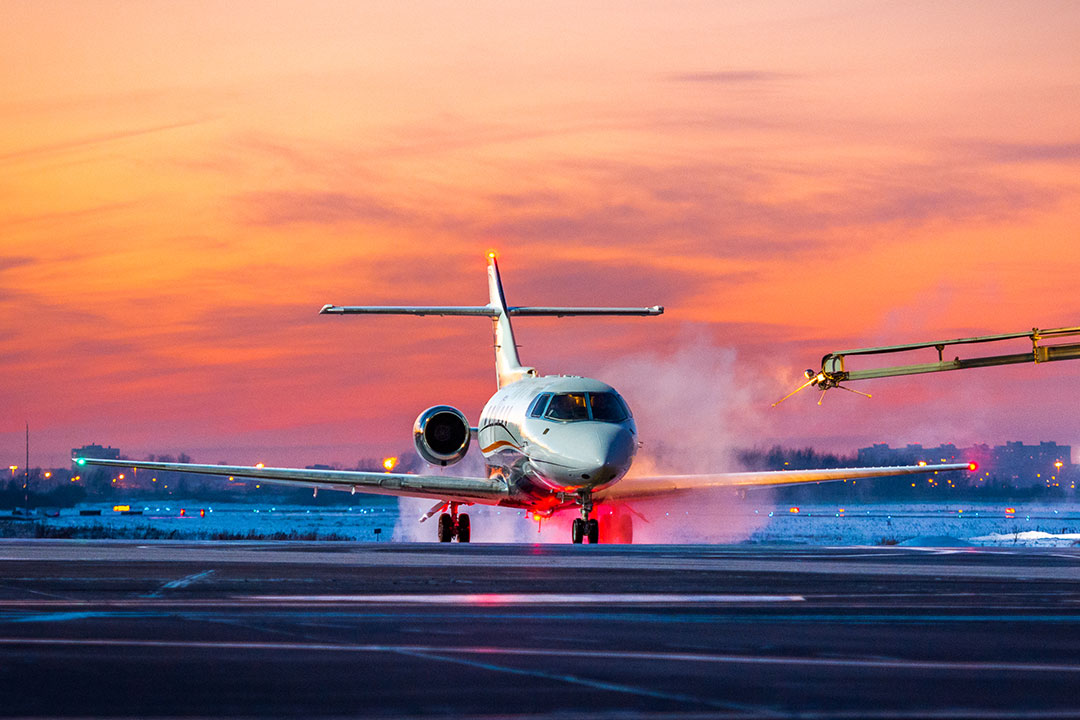 private airplane on the de-icing stand