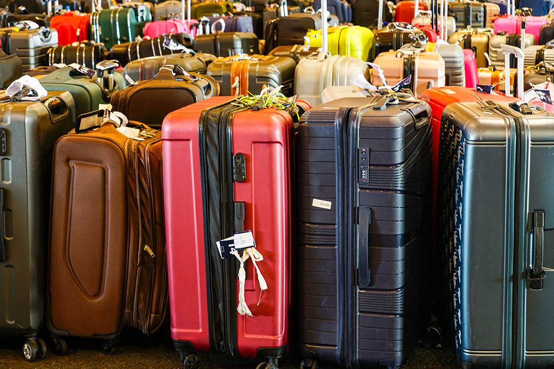 Luggage piles up.