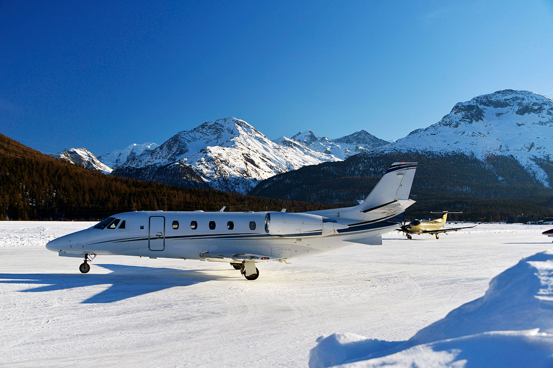 Private jet on the tarmac at Engadine, St Moritz.