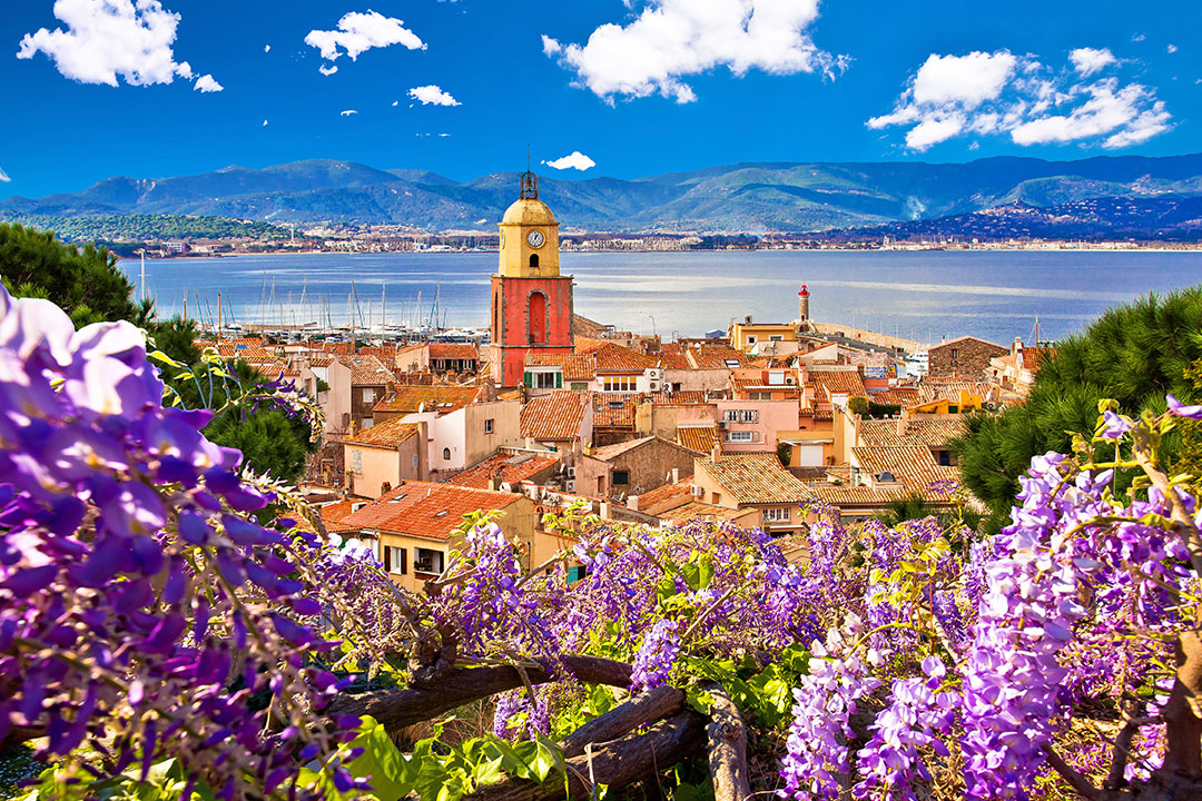 Saint Tropez village church tower and old rooftops, Cote d Azur.