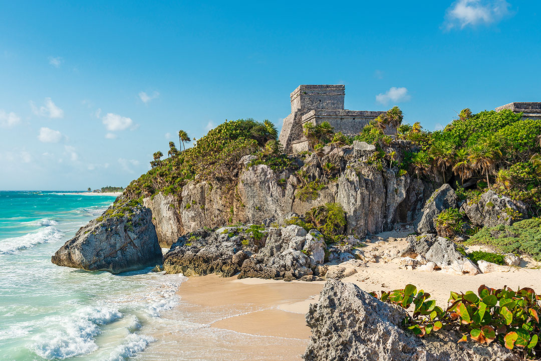 Tulum beach and maya temple ruins by Caribbean Sea, Yucatan, Mexico.